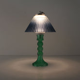 Prism rechargeable lantern (ON) with cyan base and blue gradient shade emitting a cool prismatic glow.