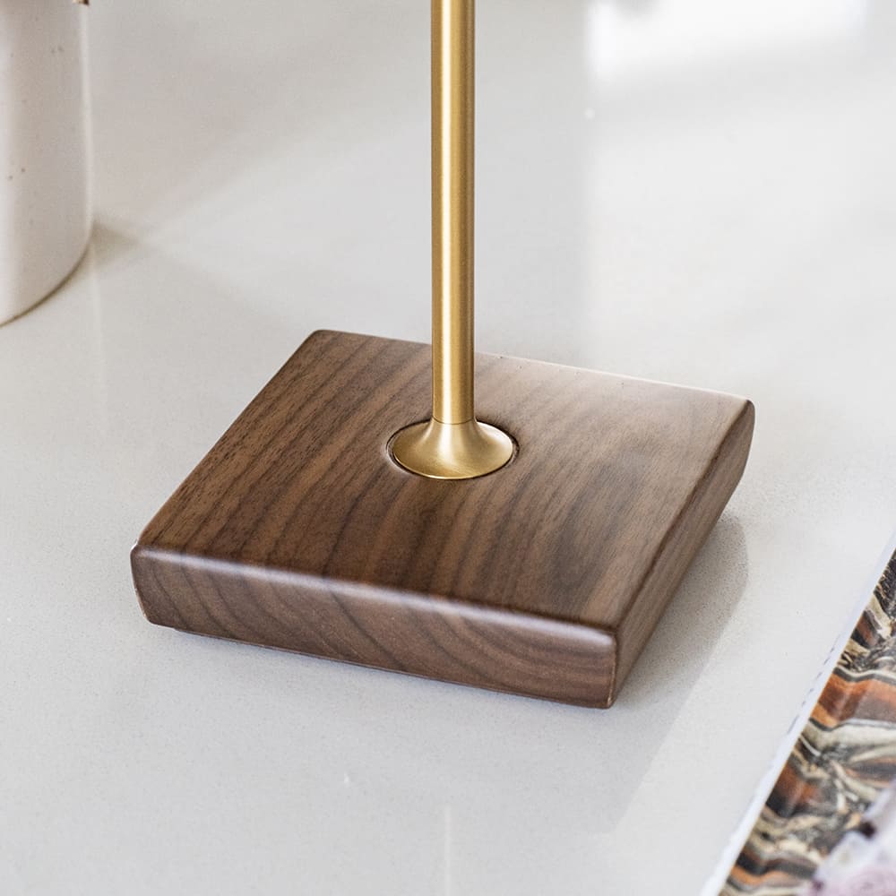 Cordless LED Table Lamp - A close-up of the square base, highlighting the quality of the ash wood and the elegant aluminum stem.