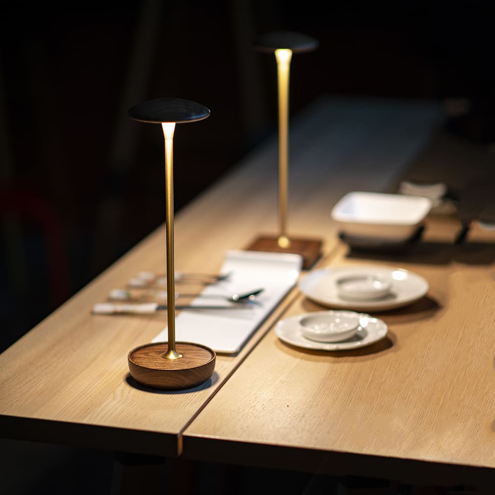 
Cordless LED Table Lamp - A line drawing comparison of the two styles (round and square base), highlighting the different heights and base shapes.