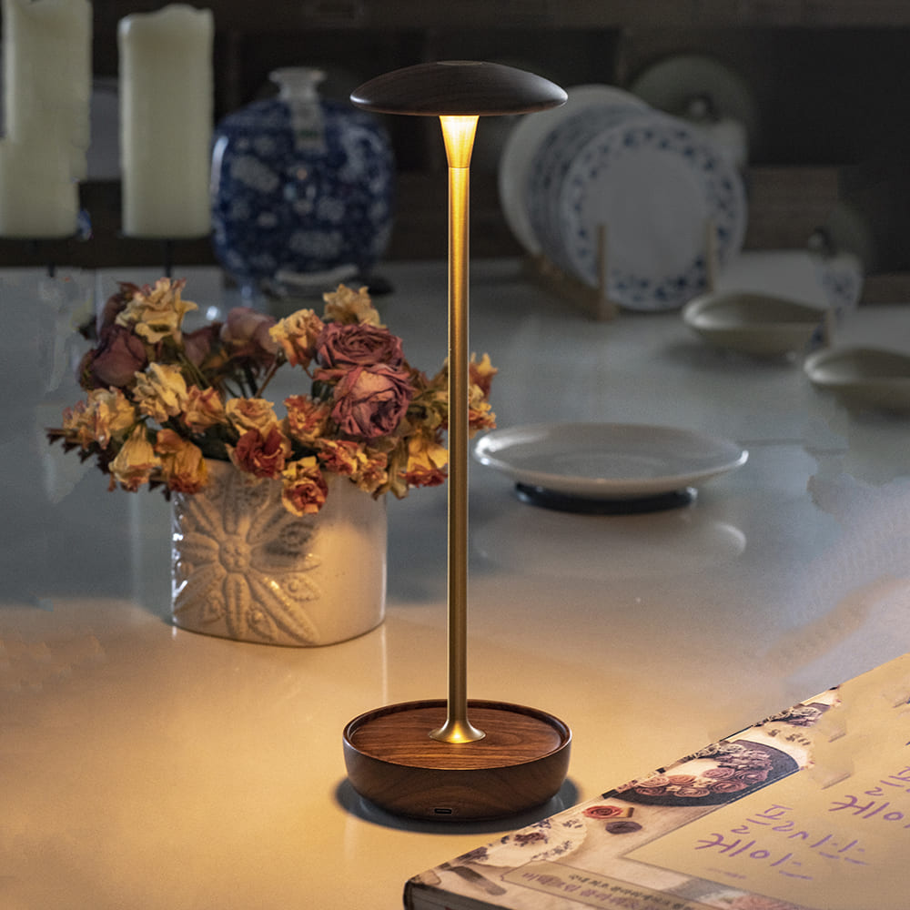  Cordless LED Table Lamp - A modern lamp with a warm glow, perfect for a cozy setting