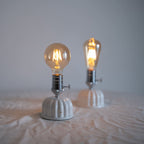 Cordless ceramic Edison bulb table lamp displaying round G80 bulb and vintage ST64 bulb options