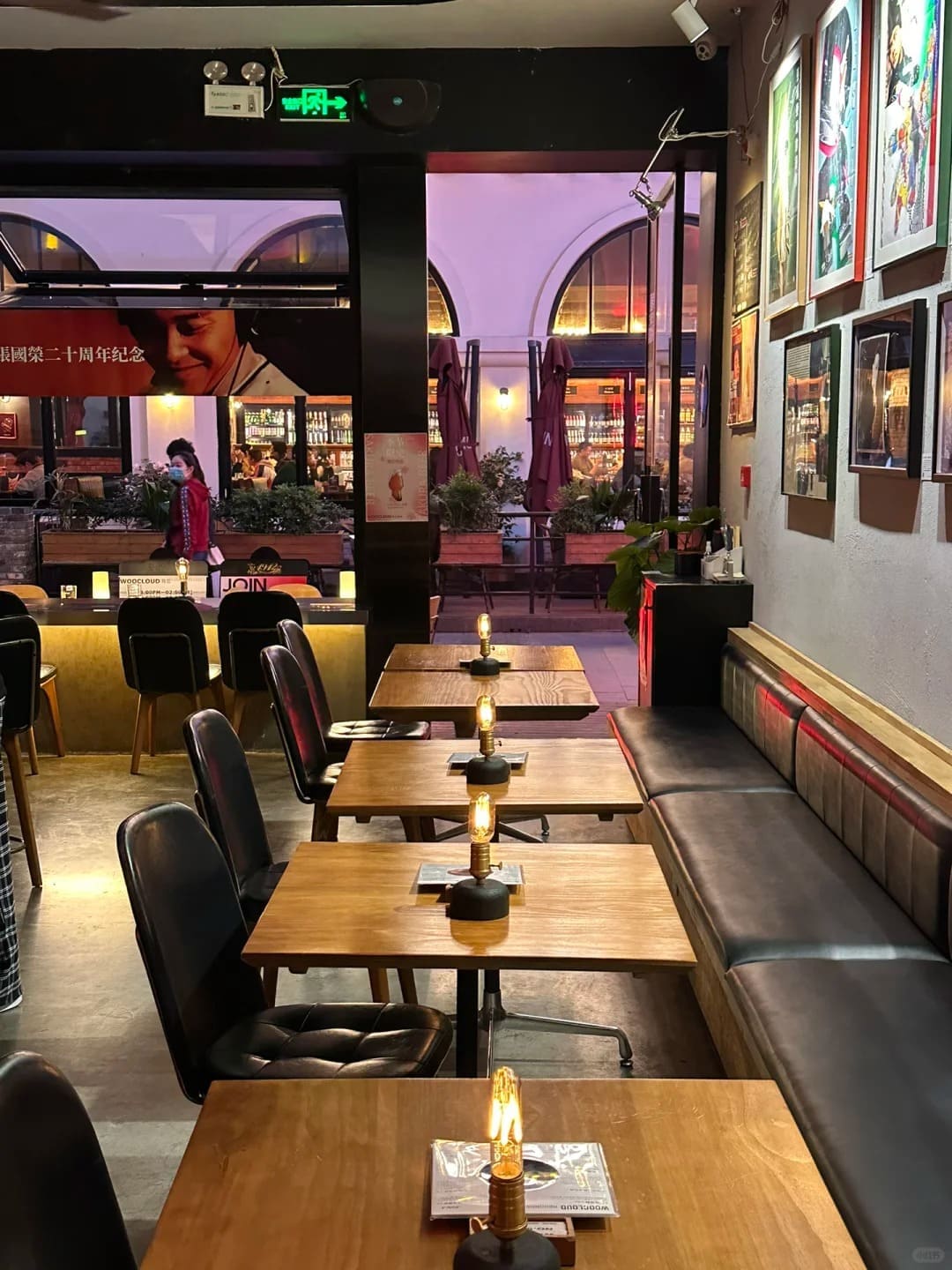 Vintage Edison cordless table lamps creating warm ambient lighting in a restaurant interior