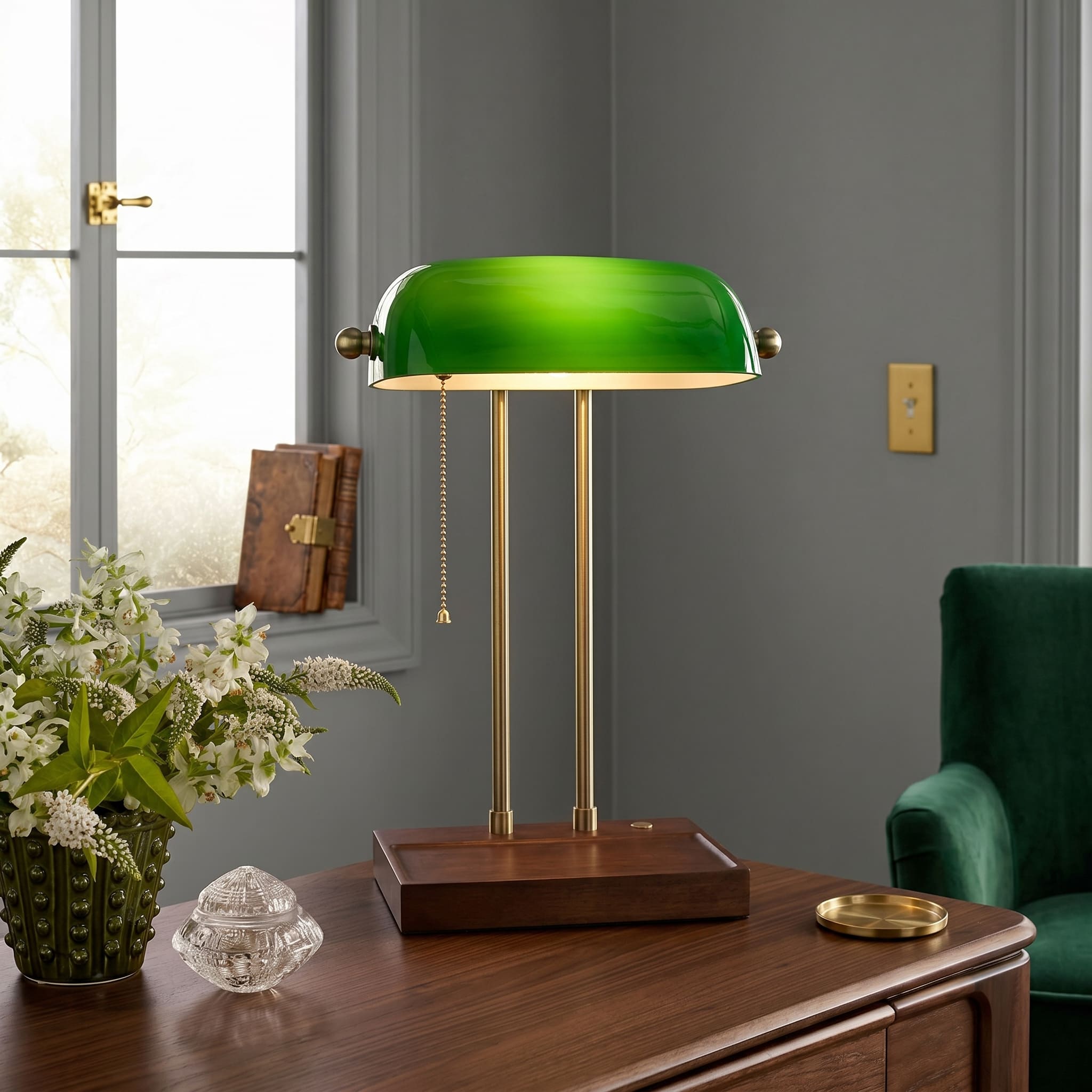 Cordless green bankers lamp with wooden base displayed on a wooden table in a classic study room