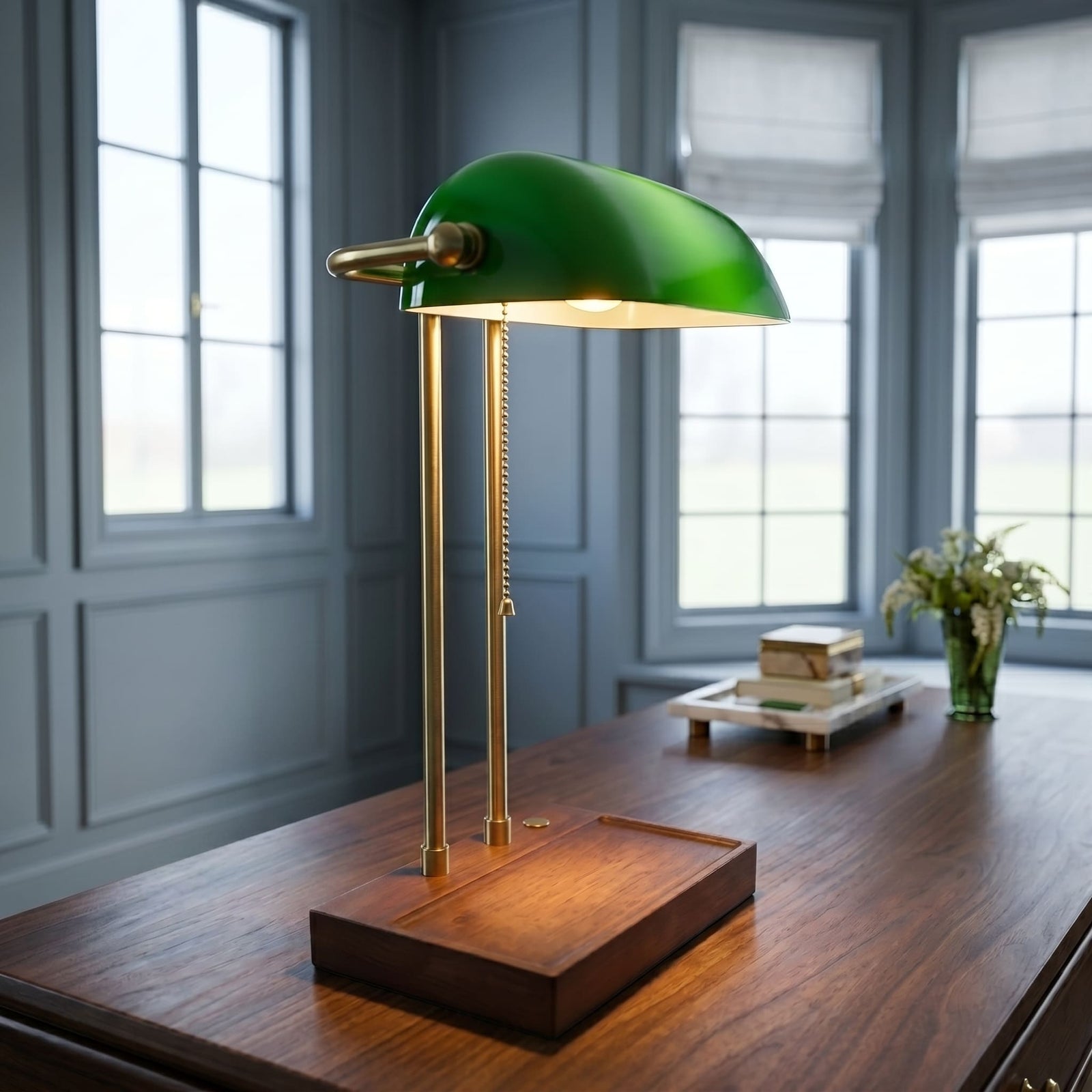 Cordless green bankers lamp with wooden base on a wooden side table next to a sofa