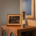 Rechargeable LED lantern providing warm ambient lighting in a living room