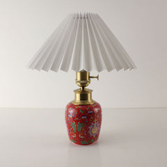 Front view of the enamel ceramic lamp with a white pleated shade (Power Off), showcasing the 3D decorative texture