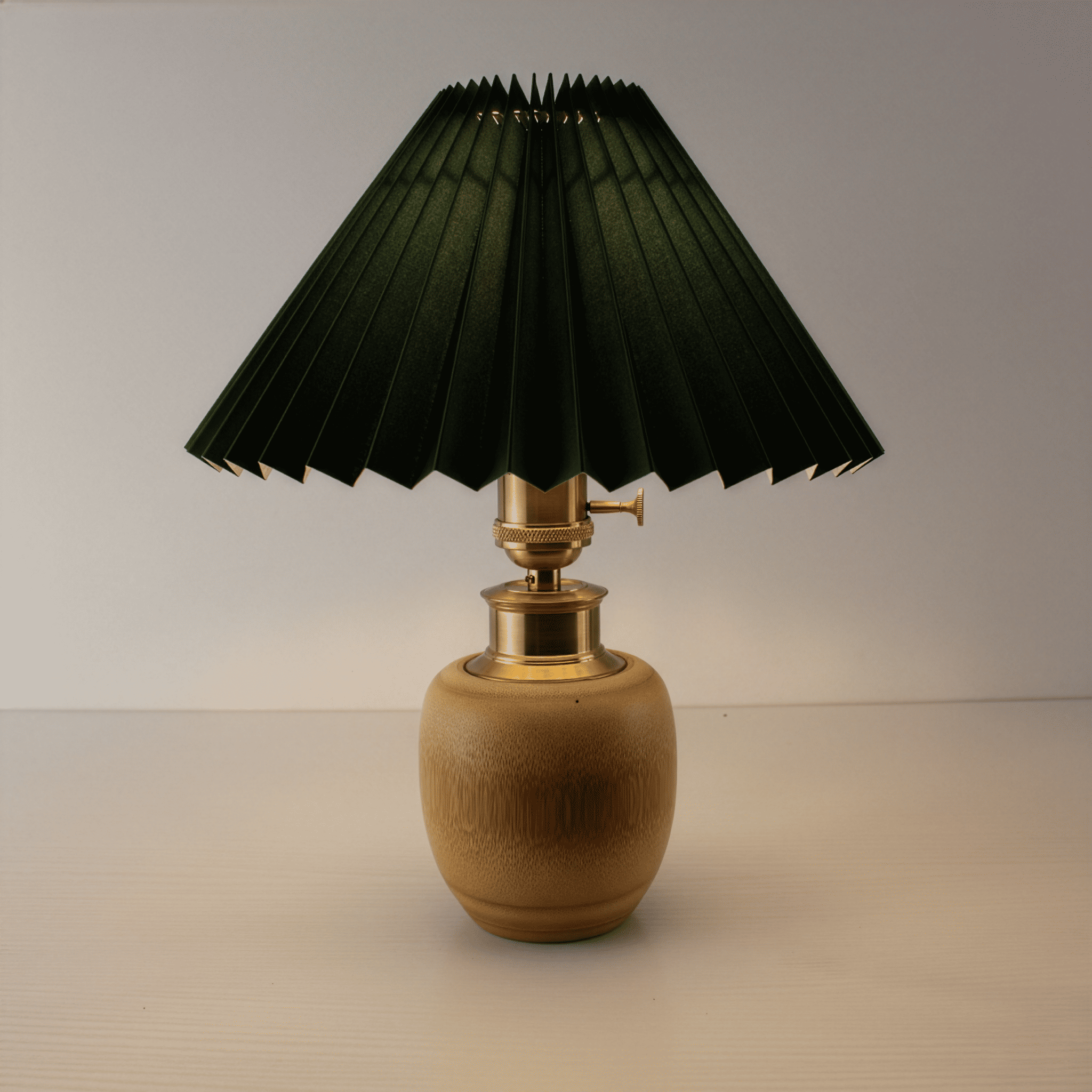 Cordless bamboo table lamp with forest green pleated shade, Mid-Century Modern style for bistro and restaurant ambiance