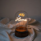 glass bell jar home led filament word table lamp closeup