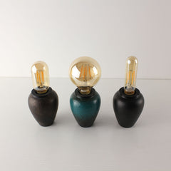 Collection of three handcrafted ceramic lamps with different bulb shapes (T45, A80, T125), illustrating the versatile Zen-style decor options