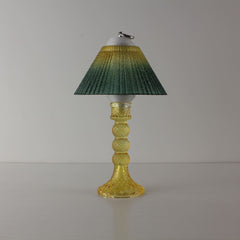 Minimalist yellow table lamp (OFF) with yellow-to-green gradient prismatic shade, perfect for modern home tabletop decor.