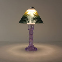 Portable wireless lantern (ON) featuring a cool purple glass base and sunlit yellow-to-green gradient shade.