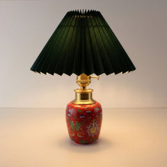 ortable rechargeable lamp with a dark green pleated shade and luxury enamel ceramic base for wireless indoor use