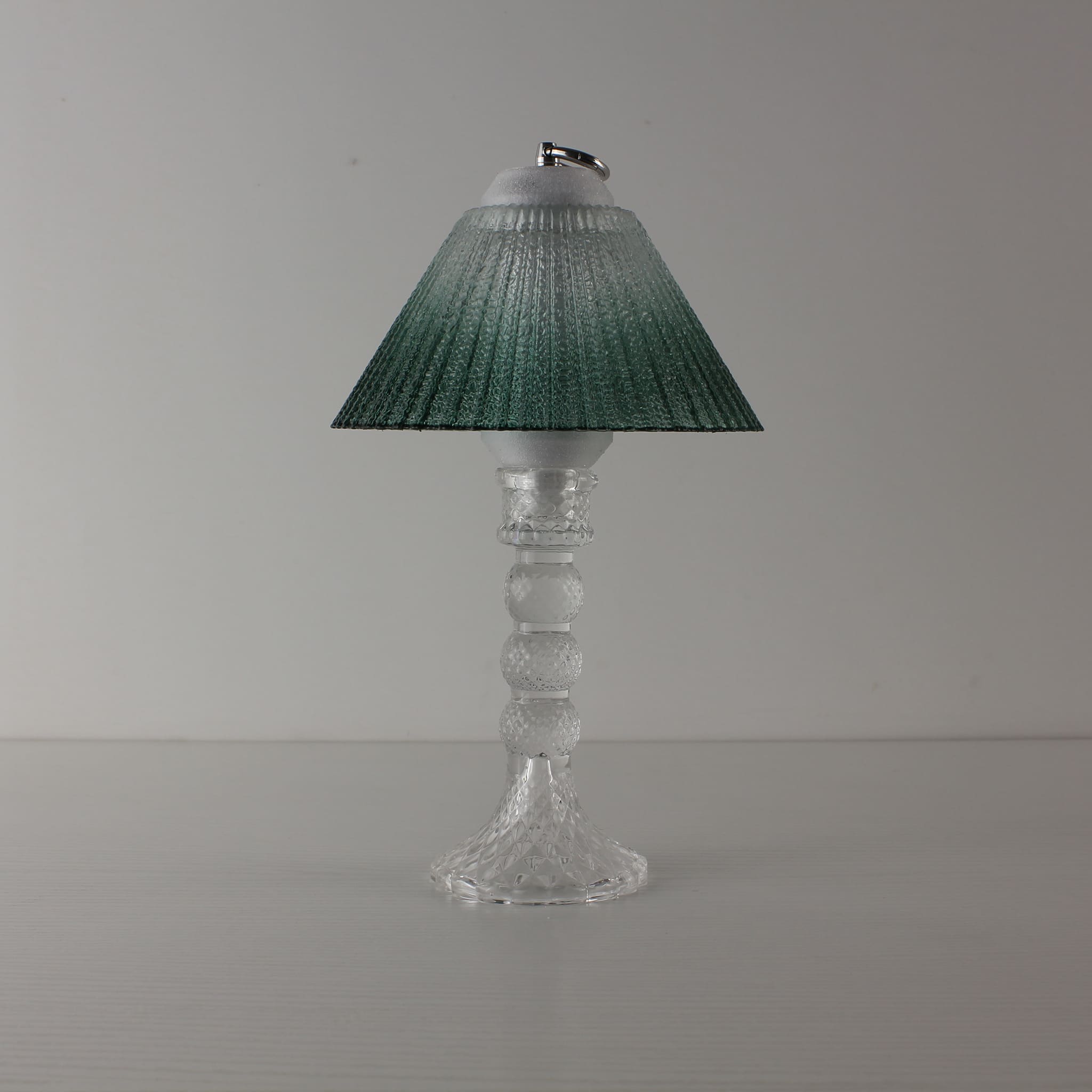 Portable clear glass lantern (OFF) with green gradient shade, highlighting the 3D printed PETG craftsmanship.