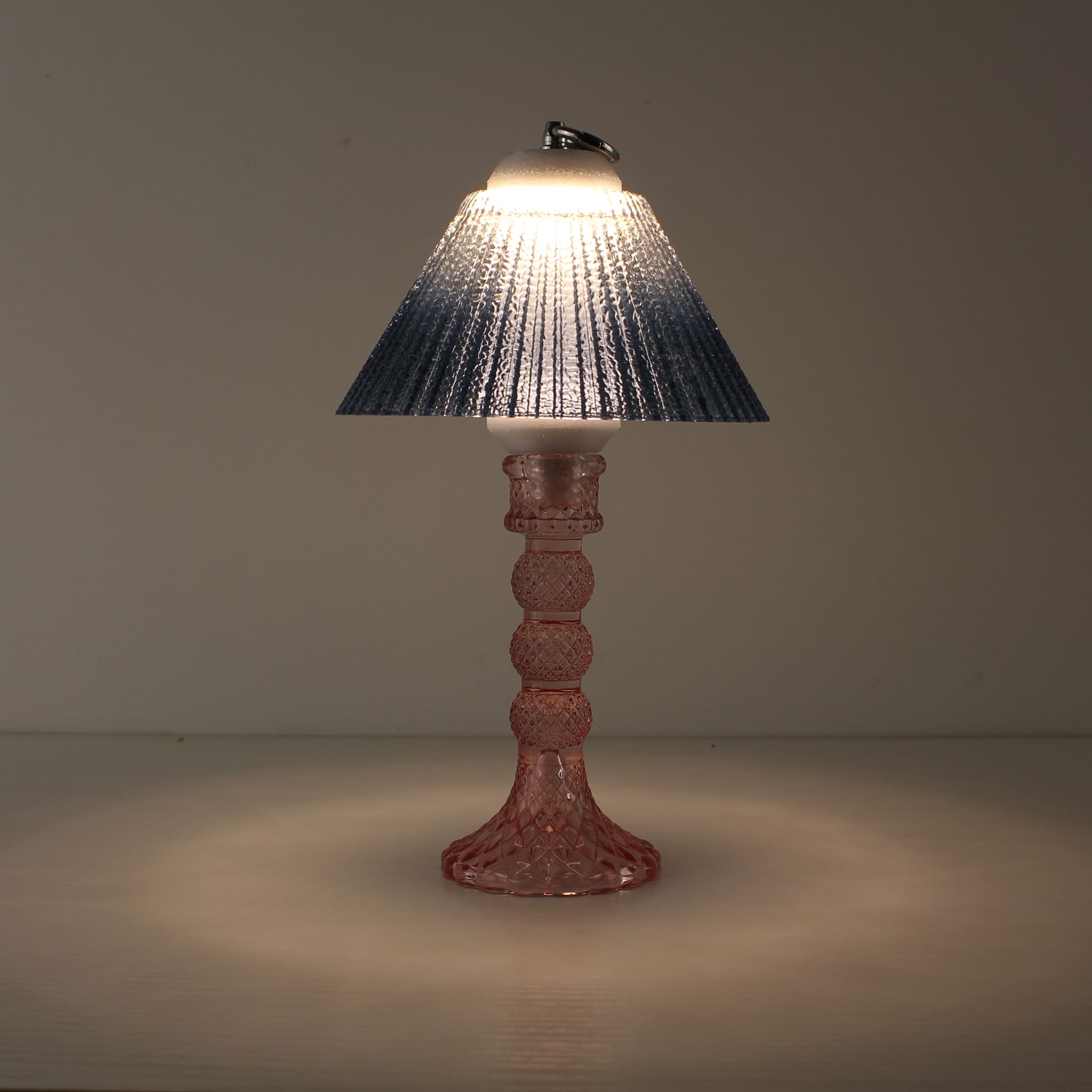 Top-down view of the purple glass lamp showing the integrated metal ring and Type-C charging port, highlighting the 5000mAh rechargeable endurance.