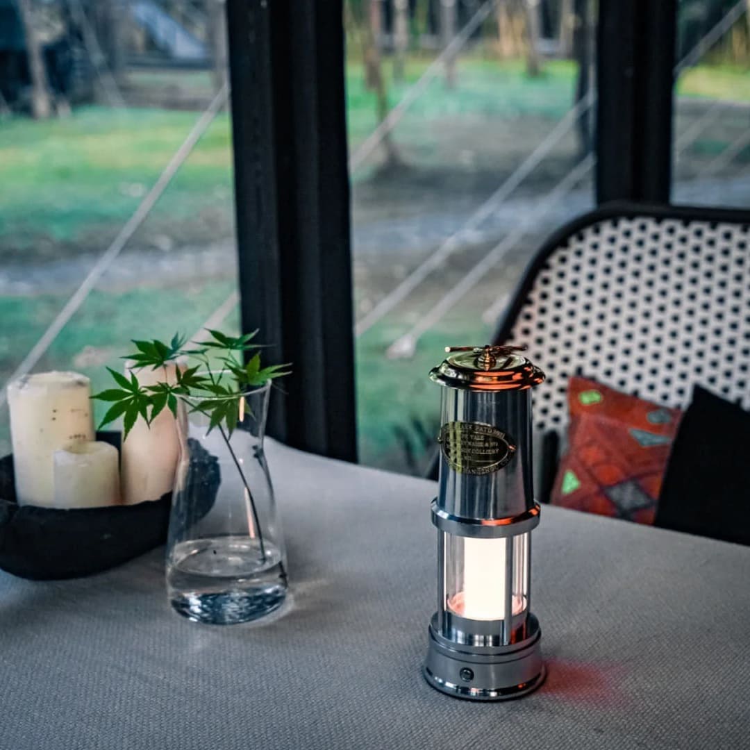 Rechargeable cordless lantern used as restaurant table lighting