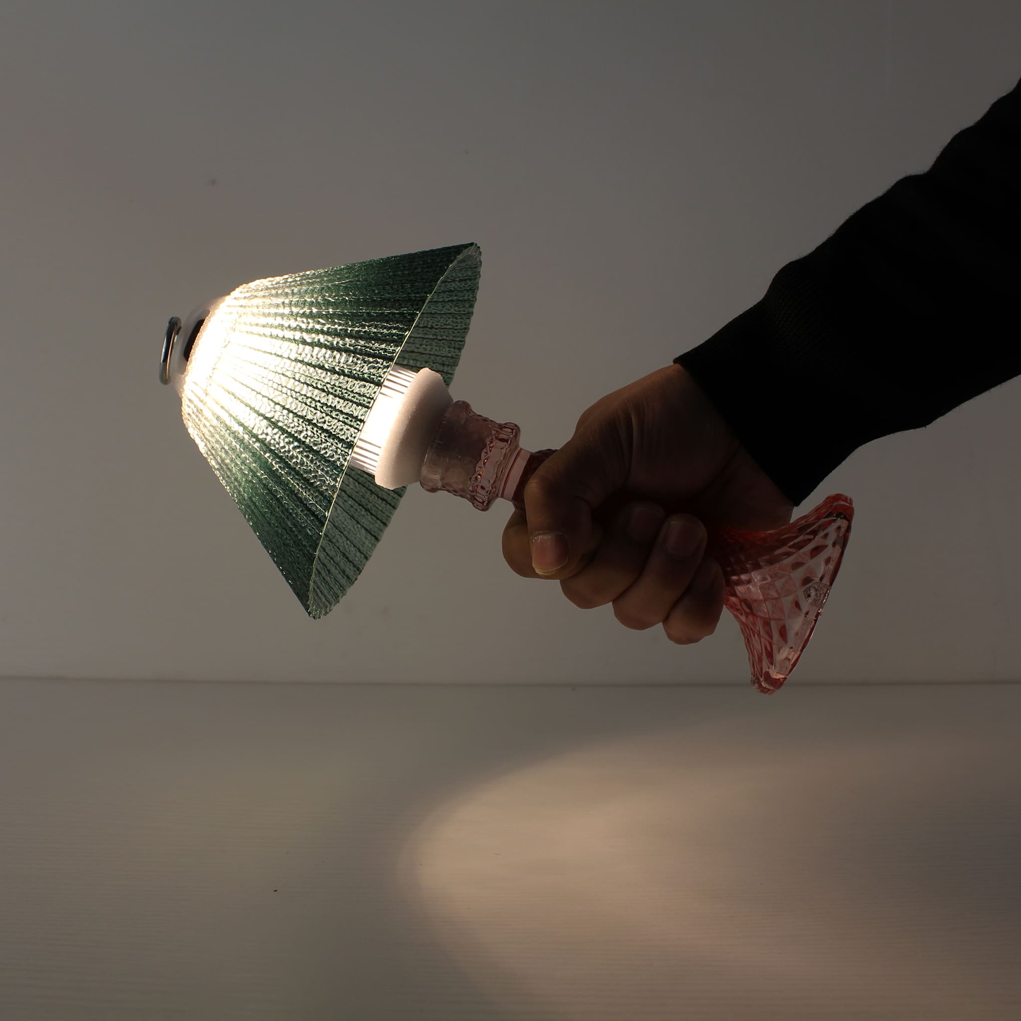 Showcase of the textured glass lamp series, emphasizing the cordless, rechargeable, and waterproof features for versatile commercial and outdoor use.