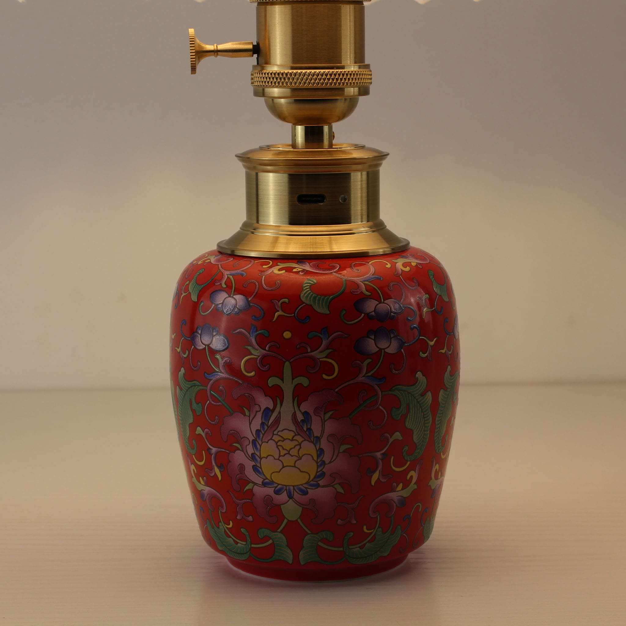 Close-up of the USB-C charging port on a rechargeable ceramic lamp, highlighting the cordless convenience and 3D floral texture